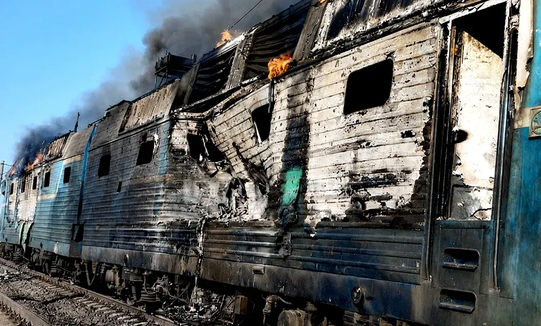 A train struck by Russia on the railway line between Dnipro and Zaporizhzhia.