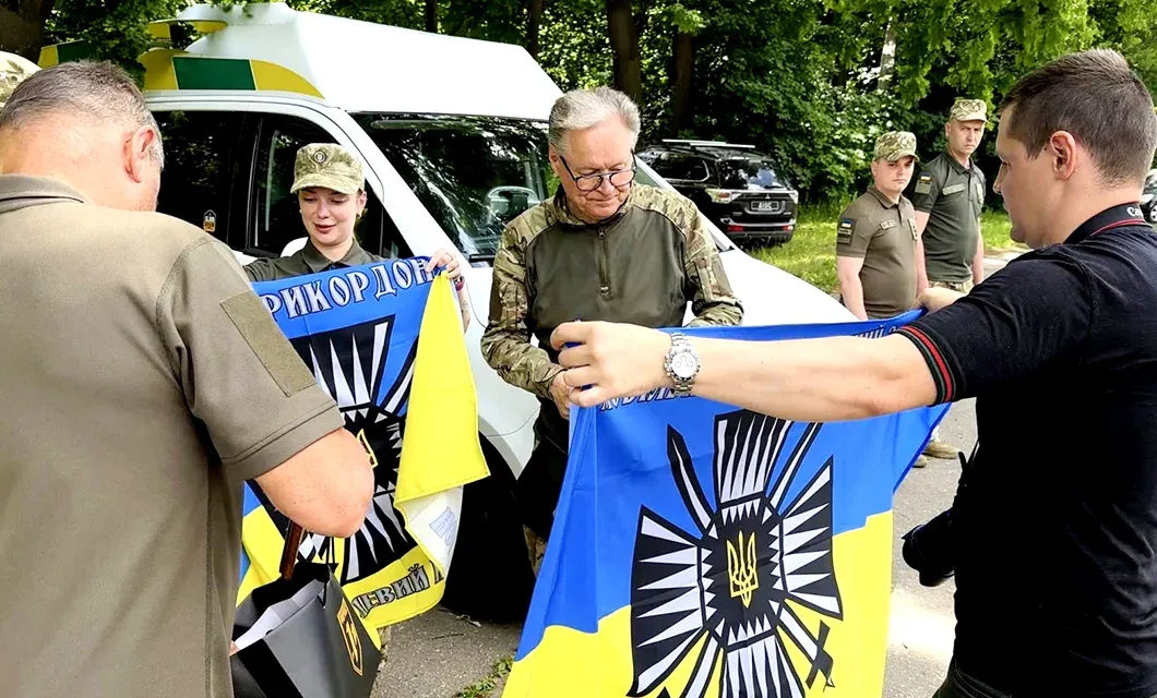 A Ukrainian flag presented during the Kharkiv ambulance handover ceremony.