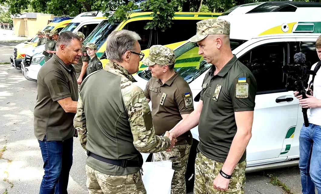 GCMM Founder and CEO Hannu Haukka and Canadian Director John Haukka hand over the keys to five ambulances to front-line health-care workers serving hospitals in the Kharkiv region.